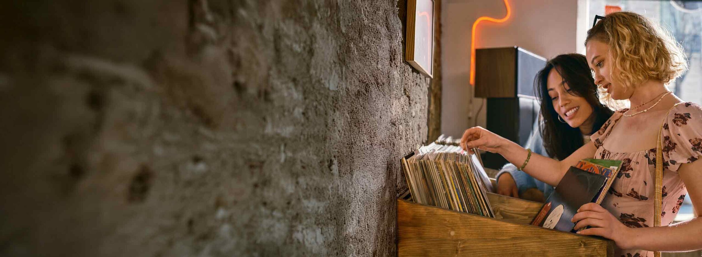 Two women in a record shop.